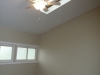 Master bedroom with vaulted ceiling and double closets
